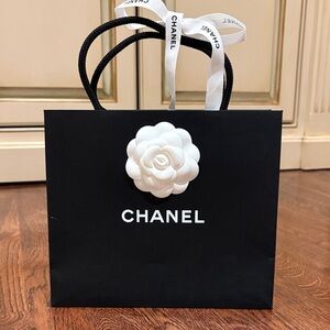 Chanel Black Bag with White Camellia